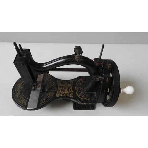 300 - A LATE 19TH CENTURY 'IMPROVED DOLLY VARDEN' SEWING MACHINE, circa 1874, 35 x 23 cm