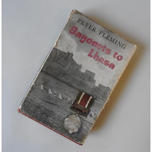 319 - PETER FLEMING 'BAYONETS TO LHASA' FIRST EDITION, with dust jacket, and a hand written signed note by... 