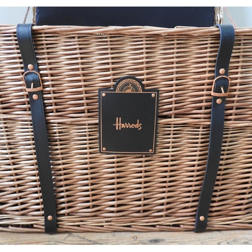 97 - A HARRODS WICKER HAMPER, with material lined interior, leather strap buckle fasteners and label, 43 ... 