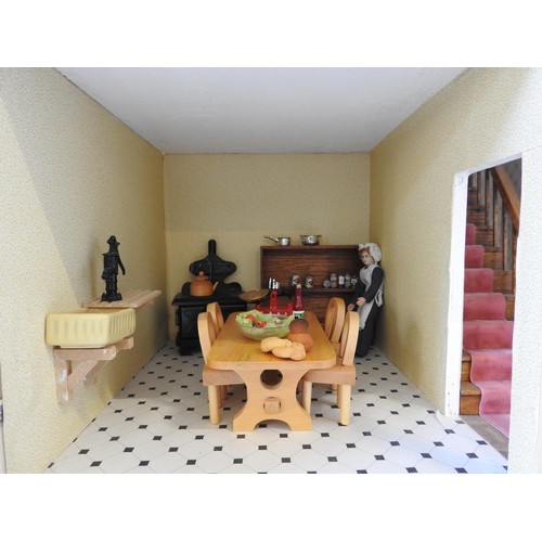 311 - A PAINTED GEORGIAN STYLE DOLL'S HOUSE, with dolls, furniture and sundries, the house measures 80 x 6... 