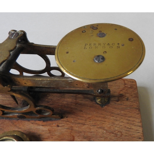 105 - A SET OF 19TH CENTURY BRASS LETTER SCALES, by Perry & Co. London, 8 x 18 x 9 cm and another larg... 