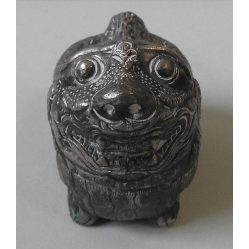 346 - A CAMBODIAN SILVER BETEL BOX, in the form of a foo dog, early 20th century, 7cm high x 8 cm long