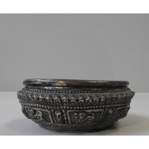 347 - A LAOS SILVER BOWL, early 20th century, ornate repousse decoration, 10 cm diameter