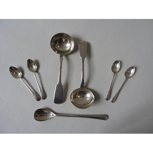 354 - A PAIR OF GEORGIAN SILVER SAUCE LADLES , circa 1827, along with four bright cut silver teaspoons and... 