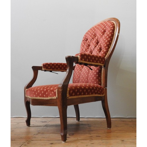 71 - A UNUSUAL VICTORIAN STYLE 20TH CENTURY RECLINING ARMCHAIR, with a buttoned, hinged back panel, the a... 