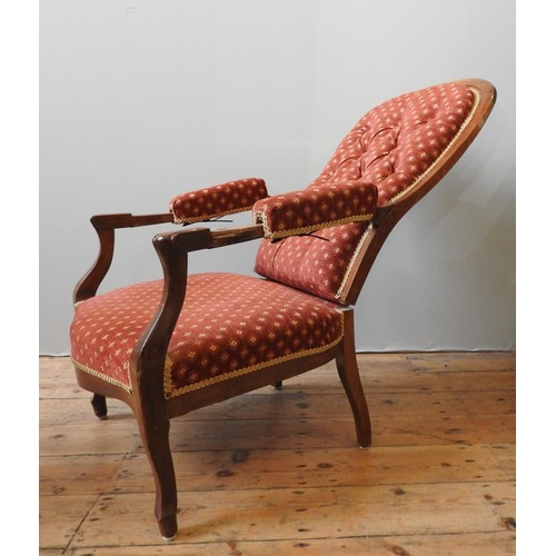 71 - A UNUSUAL VICTORIAN STYLE 20TH CENTURY RECLINING ARMCHAIR, with a buttoned, hinged back panel, the a... 