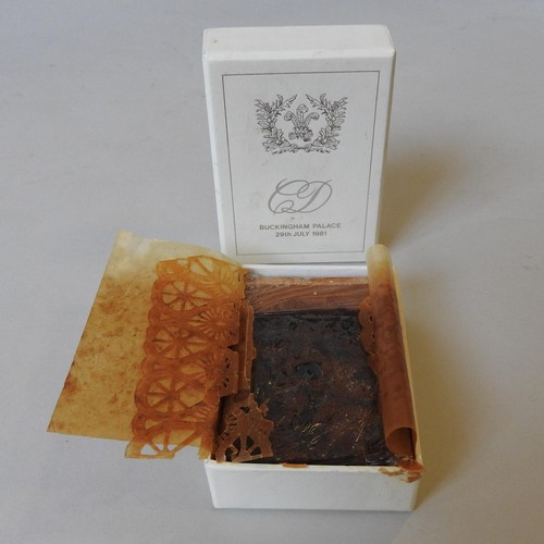303 - A PIECE OF WEDDING CAKE FROM THE WEDDING OF PRINCE CHARLES AND LADY DIANA SPENCER, in a presentation... 