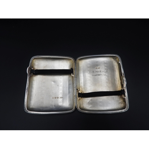 349 - A SILVER CIGARETTE CASE, Birmingham, circa 1924, monogrammed cartouche and a chased broad stripe des... 