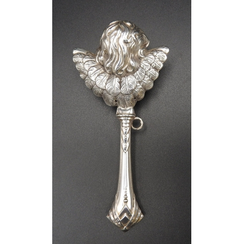 350 - A SILVER BABY'S RATTLE, in the form of a winged cherub, stamped 925, 12 cm long, 23 grams