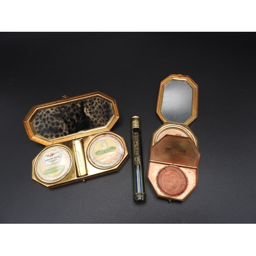 374 - TWO VINTAGE FRENCH ART DECO COMPACTS, by Houbigant, and a vial of Montjardin perfume, the compacts m... 