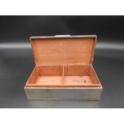 340 - A SILVER ENCASED WOODEN CIGARETTE BOX, Birmingham 1955, with an engine turned lid and presentation i... 