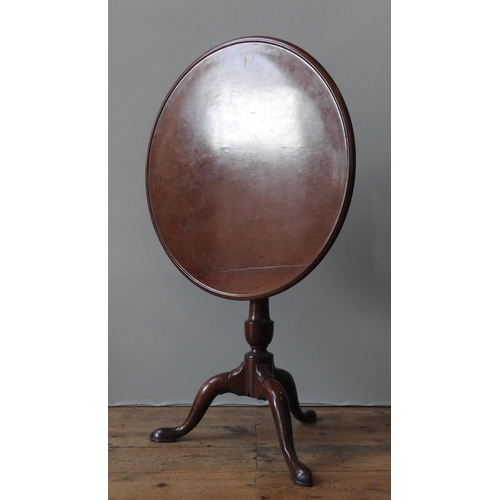 84 - A GEORGE III MAHOGANY TILT-TOP BIRDCAGE TABLE, the tilting circular one piece top set atop a turned ... 