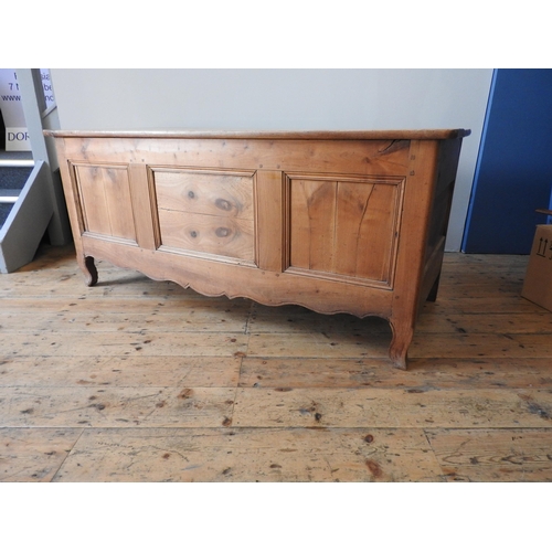 85 - A 19TH CENTURY FRENCH FRUIT WOOD COFFER, the front section with three recessed panels, 75 x 168 x 70... 