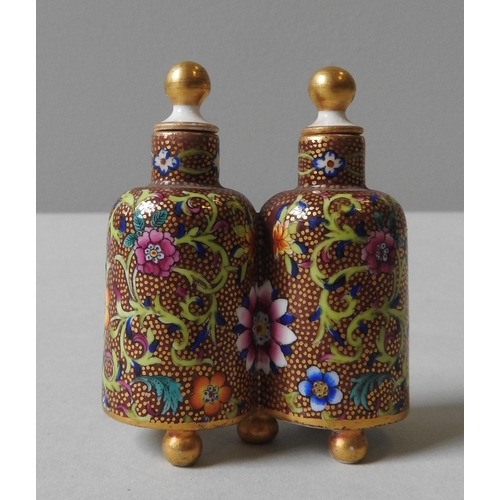 241 - A UNUSUAL CONTINENTAL 'SIDE BY SIDE' DOUBLE SCENT BOTTLE, overlaid with enamel, with vibrant floral ... 