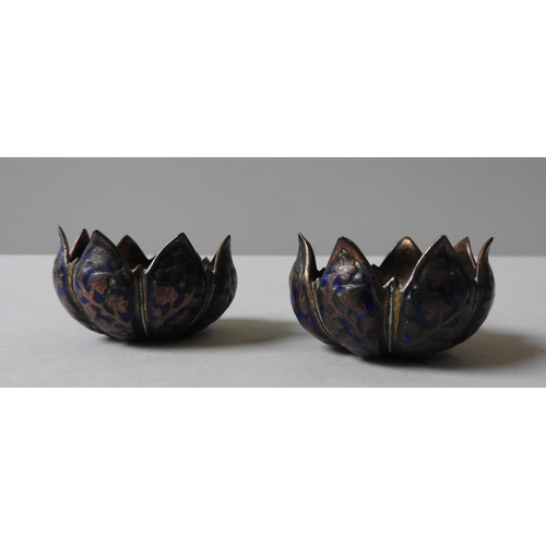 242 - A PAIR OF 19TH CENTURY BRASS SALTS, in the form of lotus flowers, the outer petals overlaid with cob... 