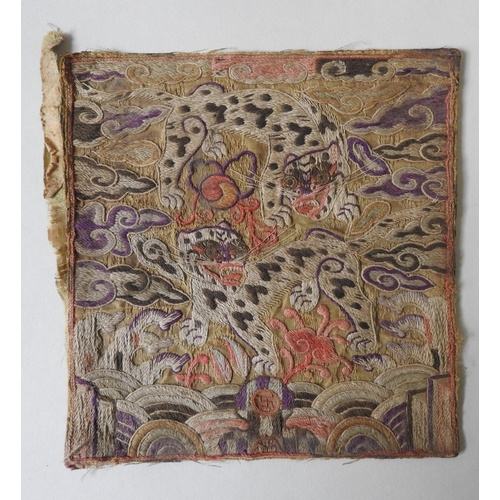 243 - A KOREAN RANK BADGE, JOSEON DYNASTY, DEPICTING TWO TIGER LEOPARDS AMONGST CLOUDS AND CRESTING WAVES,... 