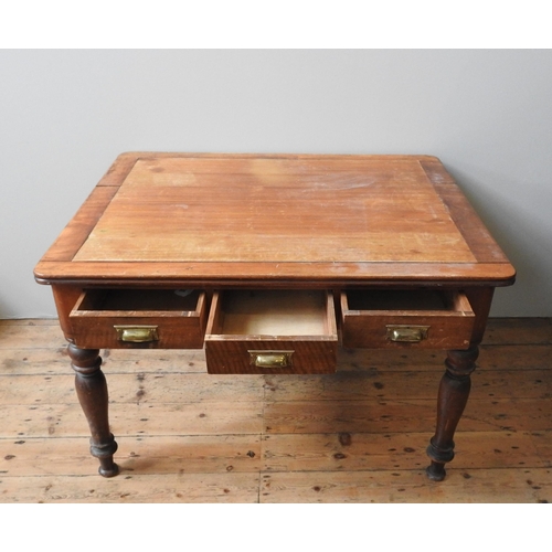 88 - A 19TH CENTURY MAHOGANY LIBRARY TABLE, with three short frieze drawers on four turned baluster legs,... 