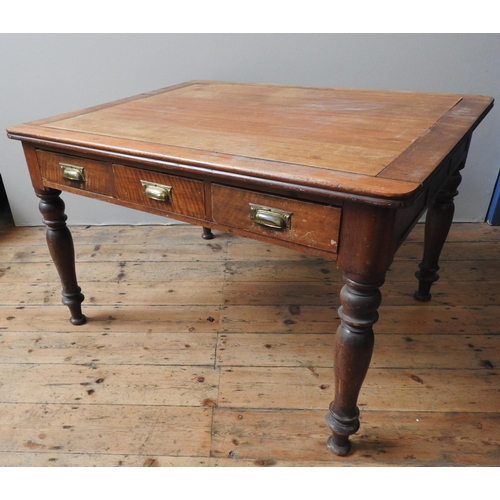 88 - A 19TH CENTURY MAHOGANY LIBRARY TABLE, with three short frieze drawers on four turned baluster legs,... 