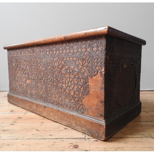 92 - AN UNUSUAL 19TH CENTURY BLANKET CHEST WITH ORNATE PIERCED LEATHER OVERLAY, 48 X 100 X 46 cm