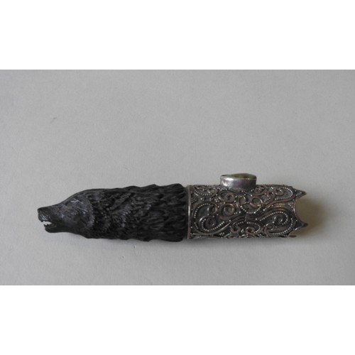 333 - A SILVER MOUNTED CARVED WOODEN HANDLE, in the form of a bear's head, inset with a hard stone