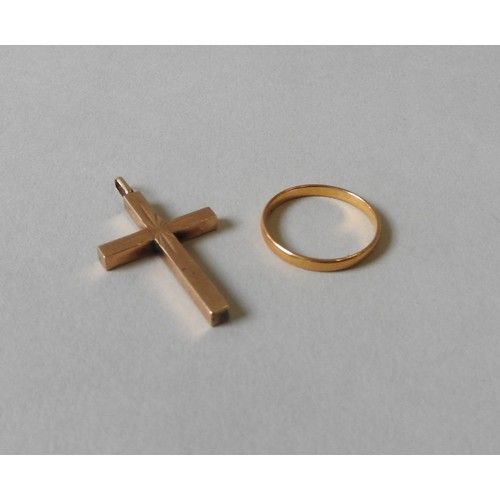 386 - A 22CT GOLD BAND RING AND A 9CT GOLD CRUCIFIX PENDANT, the band ring weighing 2 grams and the pendan... 