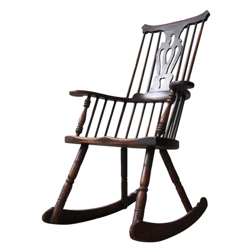 67 - AN 18TH CENTURY WINDSOR ROCKING CHAIR, with yoke shape top rail, pierced central splat and turned ba... 