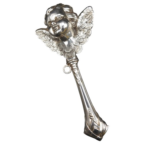 350 - A SILVER BABY'S RATTLE, in the form of a winged cherub, stamped 925, 12 cm long, 23 grams