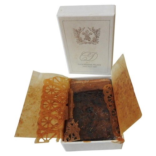303 - A PIECE OF WEDDING CAKE FROM THE WEDDING OF PRINCE CHARLES AND LADY DIANA SPENCER, in a presentation... 