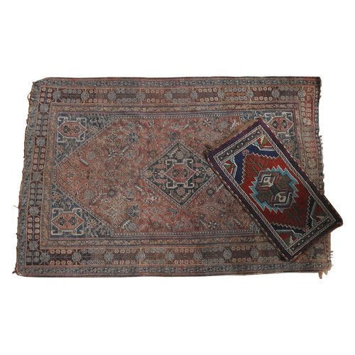 109 - A WORN PERSIAN RUG AND A PRAYER RUG