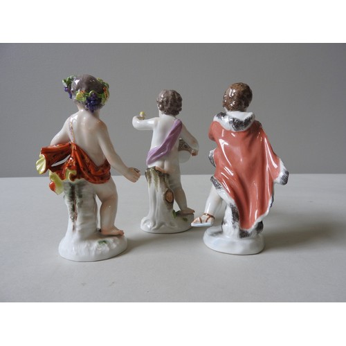 402 - THREE 19TH CENTURY MEISSEN PUTTO FIGURINES,  Bacchus style figure, putto with flower basket and putt... 