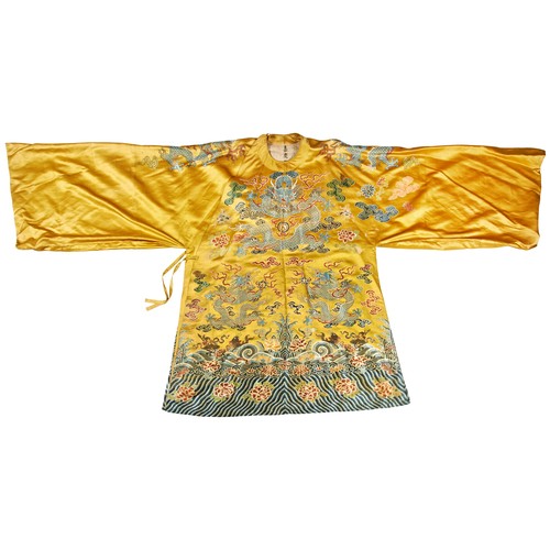 392A - YELLOW-SILK 'DRAGON' COURT ROBE, FOR A TEMPLE STATUEQING DYNASTY, 19TH CENTURYembroidered with five-... 