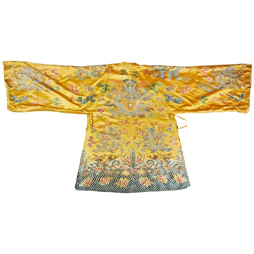 392A - YELLOW-SILK 'DRAGON' COURT ROBE, FOR A TEMPLE STATUEQING DYNASTY, 19TH CENTURYembroidered with five-... 