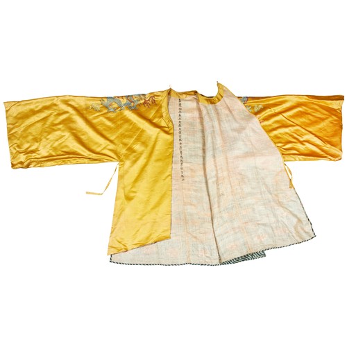 392A - YELLOW-SILK 'DRAGON' COURT ROBE, FOR A TEMPLE STATUEQING DYNASTY, 19TH CENTURYembroidered with five-... 