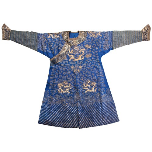 387 - BLUE-GROUND SUMMER GAUZE 'DRAGON' ROBELATE QING DYNASTYthe nine dragons embroidered in gilt threads ... 