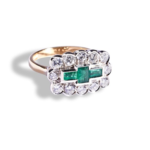 113 - AN EMERALD AND DIAMOND RING set with three baguette-cut diamonds, collet set within a bezel of twelv... 