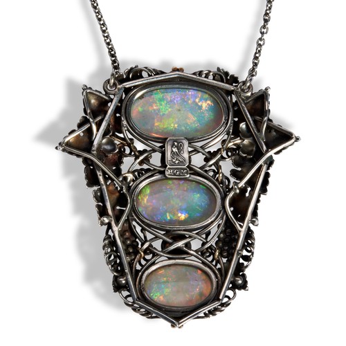 132 - H.G. MURPHY  AN ARTS & CRAFTS OPAL SILVER AND GOLD PENDANT NECKLACE,  collet set with three grad... 