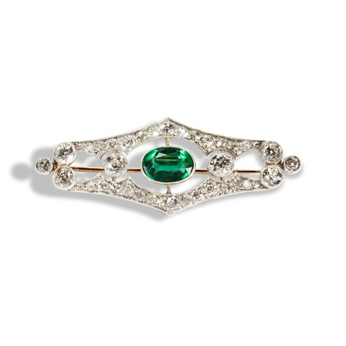 141 - AN ART DECO DIAMOND AND GREEN GLASS BROOCH, CIRCA 1930the central oval mixed-cut green glass, collet... 