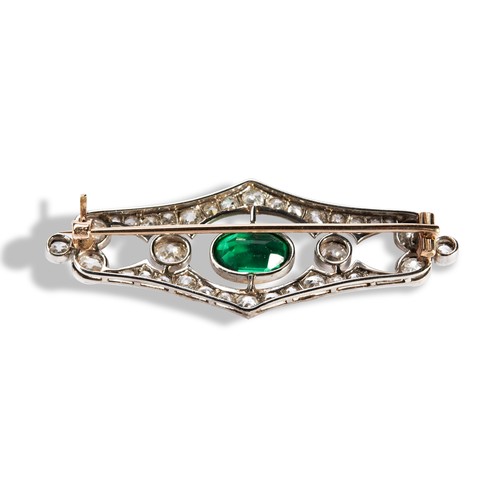 141 - AN ART DECO DIAMOND AND GREEN GLASS BROOCH, CIRCA 1930the central oval mixed-cut green glass, collet... 