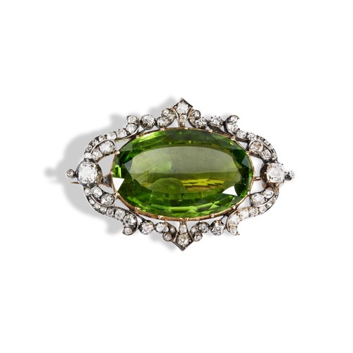 149 - 19TH CENTURY OVAL PERIDOT AND DIAMOND SET BROOCH, CIRCA  1880.the oval mixed-cut period within a pie... 