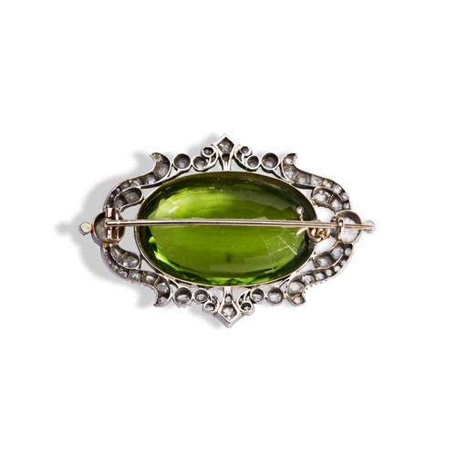 149 - 19TH CENTURY OVAL PERIDOT AND DIAMOND SET BROOCH, CIRCA  1880.the oval mixed-cut period within a pie... 