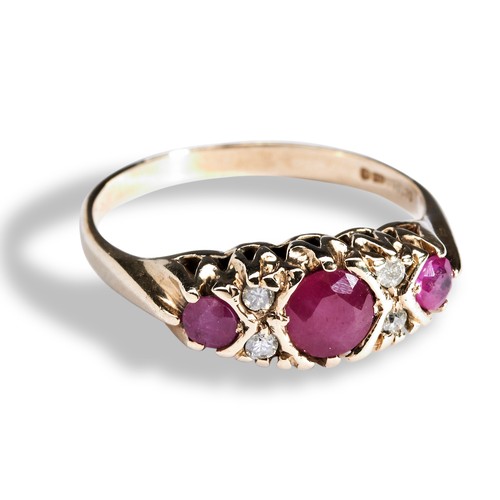 118 - A RUBY AND DIAMOND DRESS RING the three graduated round mixed-cut rubies with four round cut diamond... 