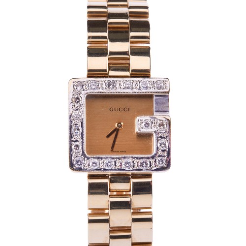 172 - GUCCI AN 18CT GOLD AND DIAMOND SET WRISTWATCH REF 3600J, gilt dial signed Gucci, the G motif logo in... 