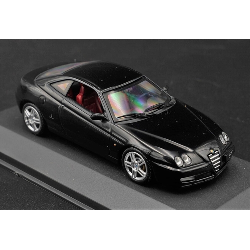 112 - 2003 ALFA-ROMEO GTV IN NERO KYLAMI BY MINICHAMPS  Diecast metal with plastic components.