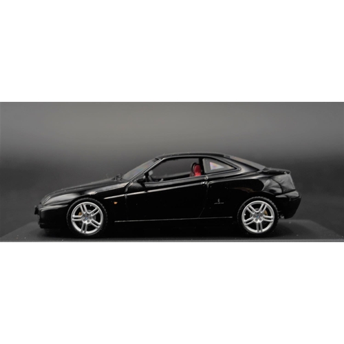 112 - 2003 ALFA-ROMEO GTV IN NERO KYLAMI BY MINICHAMPS  Diecast metal with plastic components.