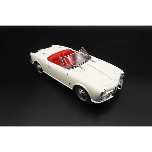 126 - 1957 ALFA-ROMEO GIULIETTA SPIDER BY AUTOART  Diecast metal with plastic components.