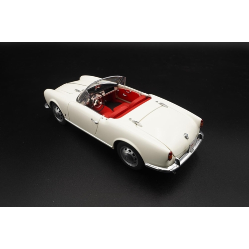 126 - 1957 ALFA-ROMEO GIULIETTA SPIDER BY AUTOART  Diecast metal with plastic components.