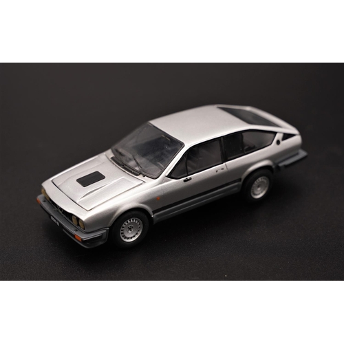 233 - 1980 ALFA-ROMEO GTV 2.5 V6 ROAD CAR BY TRON  Diecast metal model with plastic components, showing ex... 