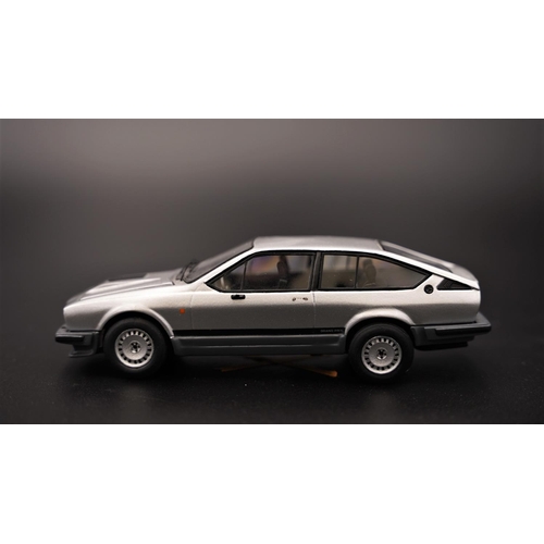 233 - 1980 ALFA-ROMEO GTV 2.5 V6 ROAD CAR BY TRON  Diecast metal model with plastic components, showing ex... 