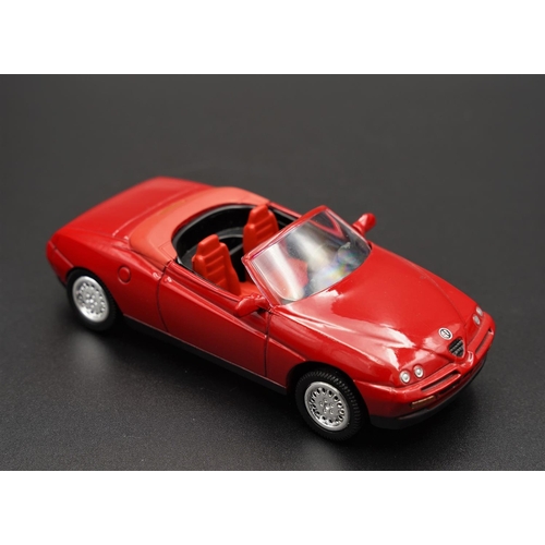 254 - 1996 ALFA-ROMEO SPYDER IN RED BY NEWRAY  Diecast metal with plastic components.