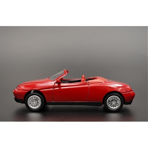 254 - 1996 ALFA-ROMEO SPYDER IN RED BY NEWRAY  Diecast metal with plastic components.